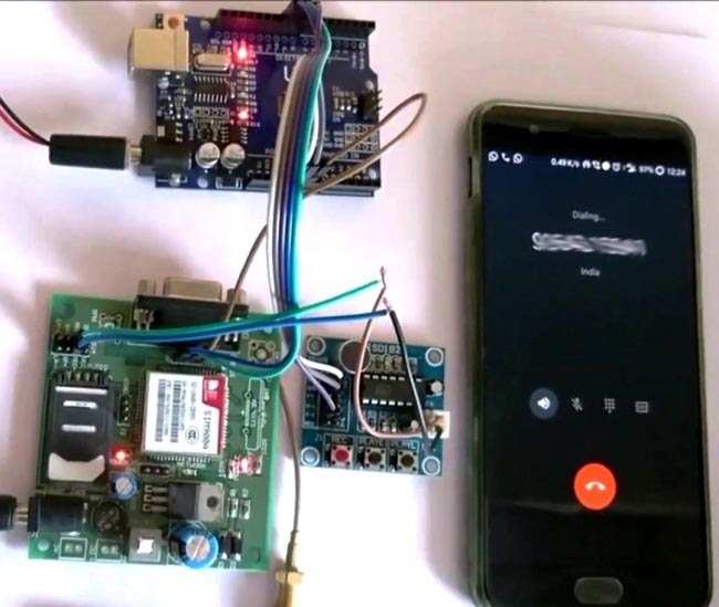 Fig. Prototype of Automatic Call answering Machine using Arduino and GSM Module Fig. Prototype of Automatic Call answering Machine using Arduino and GSM Module